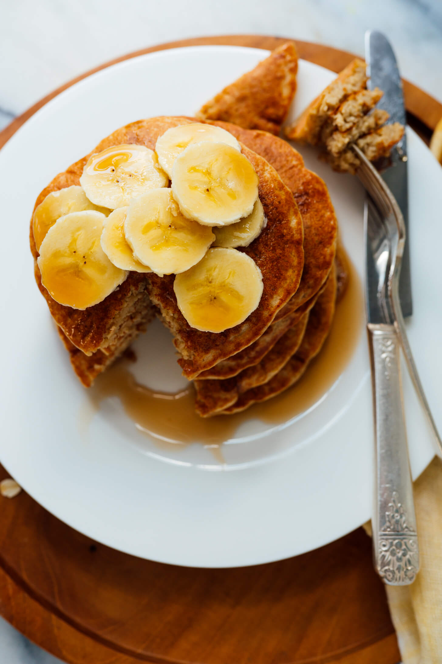 blender oatmeal pancakes with bananas on top