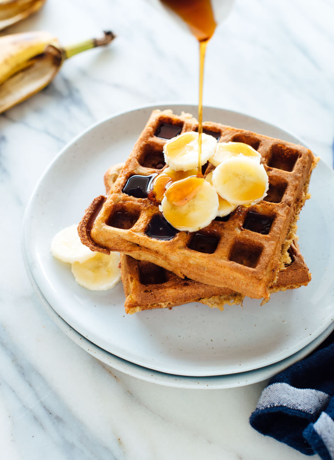 Incredible gluten-free banana oat waffles! These gluten-free waffles require only one kind of flour—oat flour—which is easy to make yourself with old-fashioned oats! cookieandkate.com